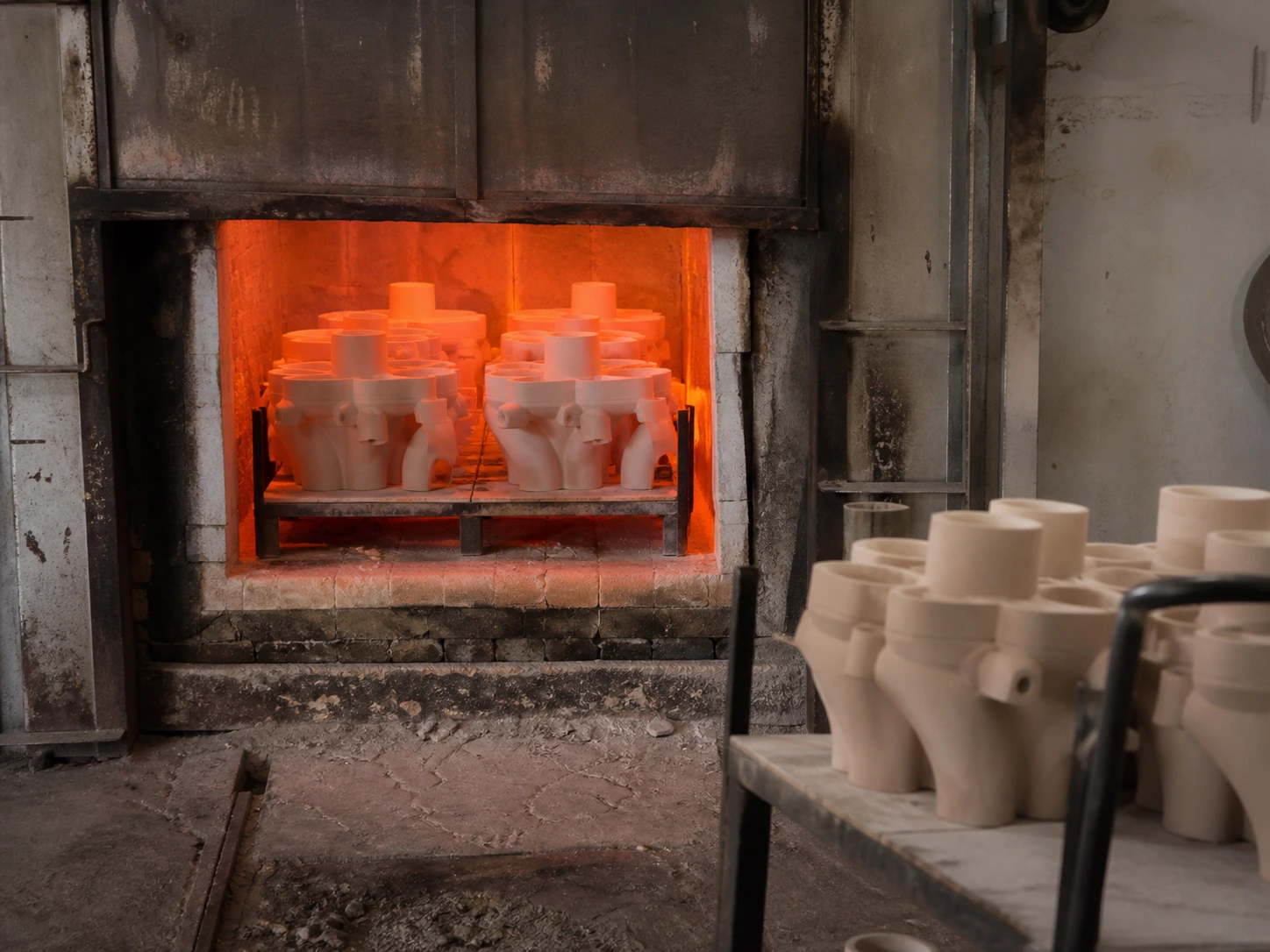 Empty ceramic shells entering the firing furnace